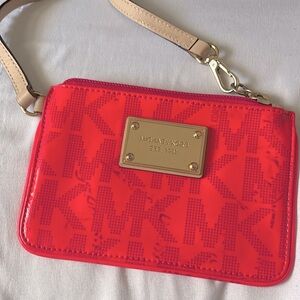 Michael Kors mini wristlet pink color